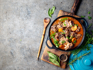 Beef ribs Bourguignon. Beef ribs stewed with carrot, onion in red wine. France dish