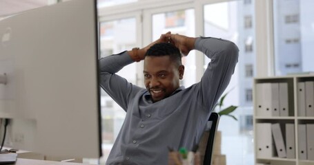 Black man, relax and break on computer for stretching, done or finished with work tasks at the office. Calm and happy African businessman relaxing with smile and hands behind head for rest or stretch