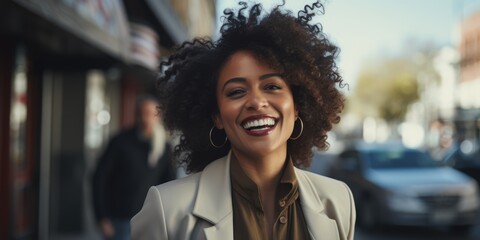 Canvas Print - Smiling elegant attractive black businesswoman looking at the camera