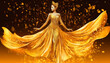 © Canvas Alchemy - Gold fashion model dress. Woman in golden silk gown flowing fabric