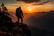 man climbing a large mountain at sunset. Silhouette and leadership concept