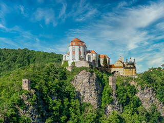 Wall Mural - Aerial panorama view of the Thaya river curving at Vranov nad Dyji with old Gothic castle structure turned into a representative Baroque residence with  the extensive landscape park