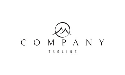 Wall Mural - vector logo on which an abstract image of two mountains against the background of the sun.