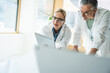 © Westend61 - Scientists working with tablet computer in laboratory