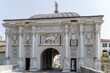 facade of san Tomaso monumental entrance in city walls, Treviso, Italy