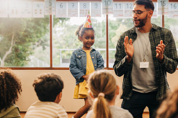 Wall Mural - Birthday celebration at primary school class