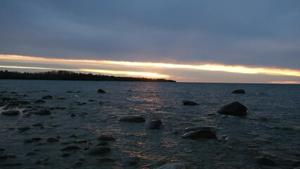 Sticker - Beautiful view of sea beach with rocks and cloudy sky on the horizon