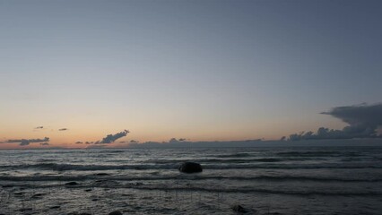 Sticker - Beautiful view of sea beach with rocks and cloudy sky on the horizon