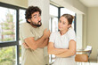 © kues1 - young adult couple shrugging, feeling confused and uncertain, doubting with arms crossed and puzzled look