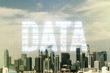 Wall Mural - data word hologram on los angeles office buildings background, big data and blockchain concept. mult