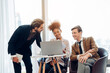 © kelvn - Professional business people having a meeting in a boardroom
