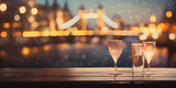 Fototapeta Londyn - Wooden table top with misty glass with a blurred cafe in London in the evening—colorful fireworks with a bokeh background.
