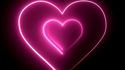 Wall Mural - Glowing heart on black background. Concept of love.