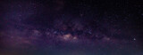 Fototapeta  - Panorama blue night sky milky way and star on dark background.Universe filled with stars, nebula and galaxy with noise and grain.Photo by long exposure and select white balance.Dark night sky.