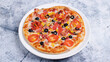 © Tural - Vegetables and sausage pizza isolated