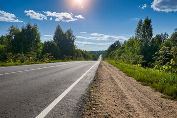 Wall Mural - Russia, Tver region, road to Lake Seliger extending distance to the horizon