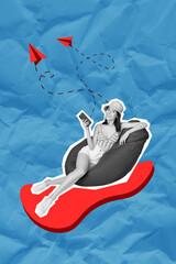 Poster - Lying beanbag chill woman sending sms paper airplane remote telegram messenger figurative ad isolated on crumpled blue color background