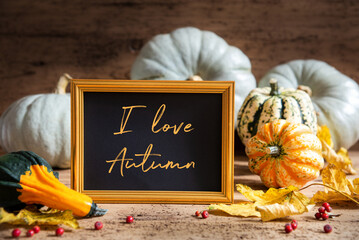 Wall Mural - autumn pumpkin decoration, text i love autumn, golden frame