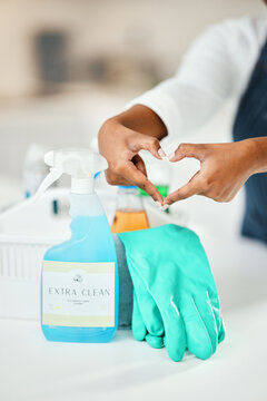 heart hands, cleaner and chemical detergent bottle, cleaning kitchen and closeup of supplies for hyg