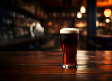 A Glass Of Dark Beer On The Bar. AI Generation