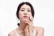 © PHOTOGRAPHER JH - picture of a young girl with clean skin on a white background. Skin care and beauty.