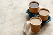 Many paper cups with coffee. Coffee to go background