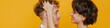 © Drobot Dean - Young beautiful smiling short-haired woman playing with her boyfriend hair