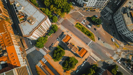 Wall Mural - Modern city intersection, modern commercial buildings of business district, from above