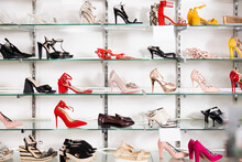 In Shop Window Number Of Women Shoes Of Various Brands With Affordable Price.Peep Toe, Escarpins, Moccasins, Slingback, T-strap, Ankle Strap Shoes, Kitten Heels, Sandals, Flip Flop, Platform On Shelf