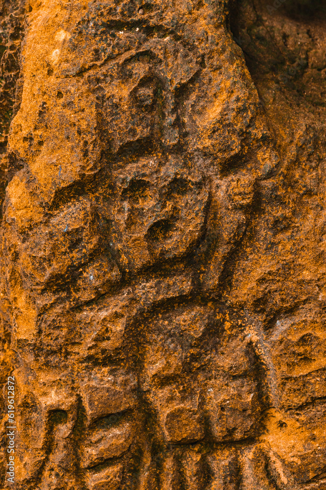 Rock texture hieroglyphs Taino art carved in the wall of the cave in ...