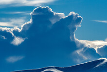 USA, Idaho, Bellevue, Backlit Clouds In Blue Sky