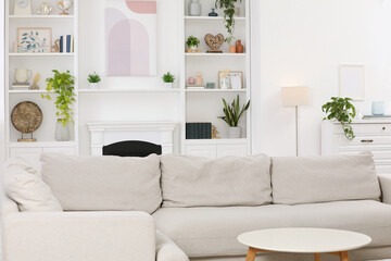 Poster - Stylish living room interior with comfortable sofa and side table