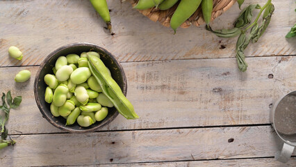 Fresh and raw green broad beans