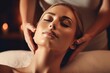 © Salsabila Ariadina - young woman lying on a bed and enjoying a massage at the spa
