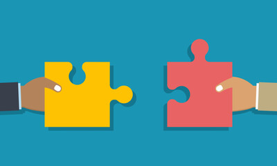 Wall Mural - Teamwork or collaboration concept. Two hands holding jigsaw puzzle pieces to put them together as sign of partnership. Metaphor of team work. Flat design. Vector illustration.