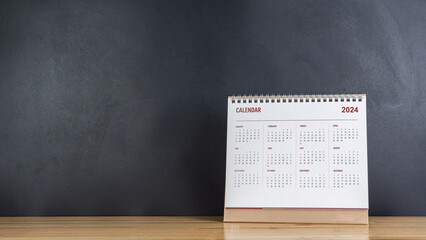 calendar year 2024 schedule on wood table blackboard background. 2024 calendar planning appointment 