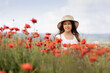 © Evgenia Tiplyashina - A girl in a poppy field
