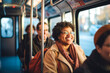 © MVProductions - A diverse group of people commencing their morning commute on a city bus