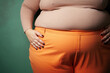 Close up of an overweight obese woman. Plus size female waistline