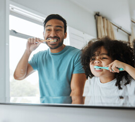 Canvas Print - Father, son and brushing teeth together in mirror, bathroom or home for hygiene, teaching or oral care. Man, child and toothbrush with foam, cleaning and learning for health, mouth and dental results