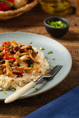 Wall Mural - Pork chop with peppers, mushrooms and bamboo. Served with rice.