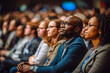 © MVProductions - Diverse engaged conference attendees attentively listening to captivating speaker. Generative AI