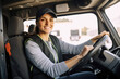 © MVProductions - Candid shot of a confident caucasian female delivery truck driver. Generative AI