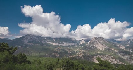 Wall Mural - Timelapse of moving clouds over Taurus mountains in Turkey