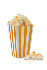 Yellow white striped carton bucket with tasty cheese popcorn, isolated on transparent background, PNG. Box with scattering of popcorn grains. Fast food, movies, cinema and entertainment concept.