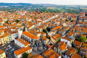 Wall Mural - Scenic aerial view of houses, streets and churches of French city of Riom