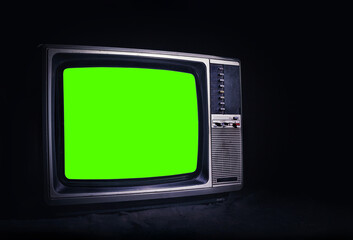 Retro old TV It's still life with green screen in dark room