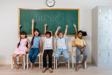 Portrait of diverse children student in classroom at elementary school.