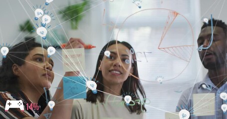 Poster - Animation of connected light bulbs over diverse colleagues discussing over glass wall in office