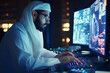 © Rafa Fernandez - An Arab System Administrator Working in a Research E-Business Facility on a Desktop Computer. AI Generative